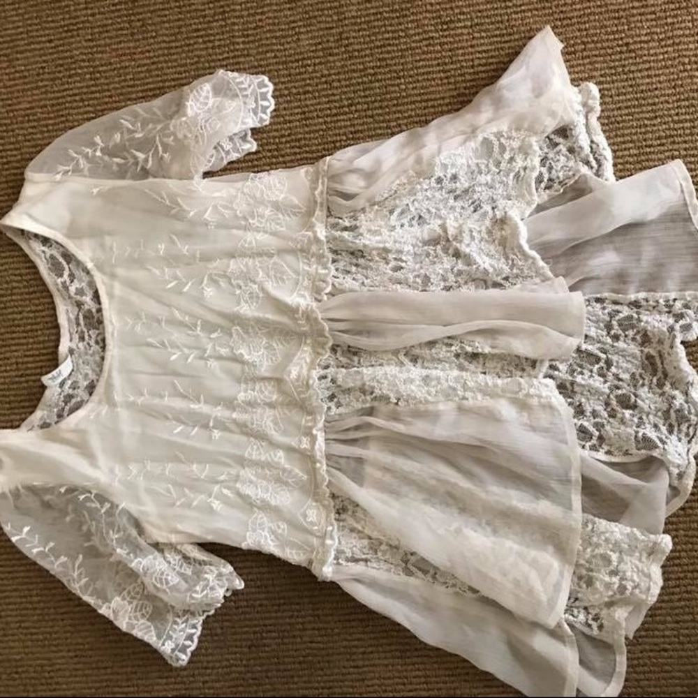 Free people embroidered lace top.